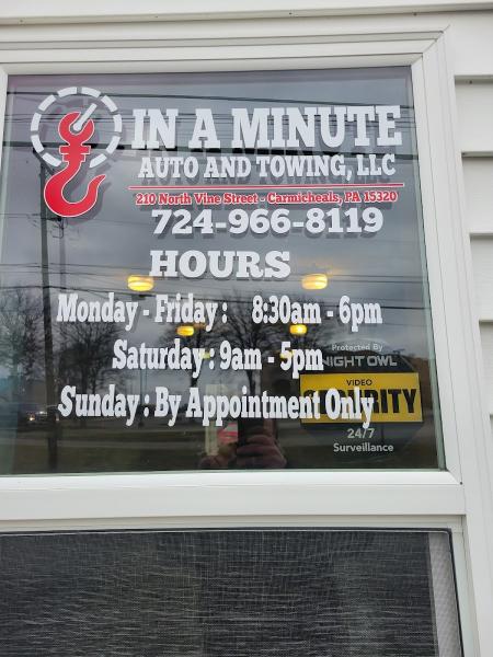 In A Minute Auto & Towing LLC