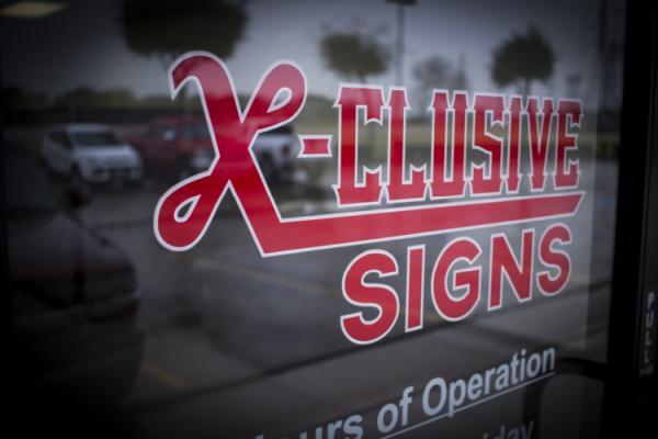 X-Clusive Signs