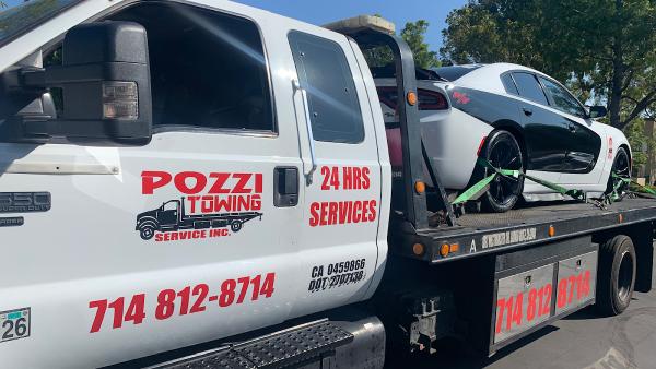 Pozzi Towing Inc