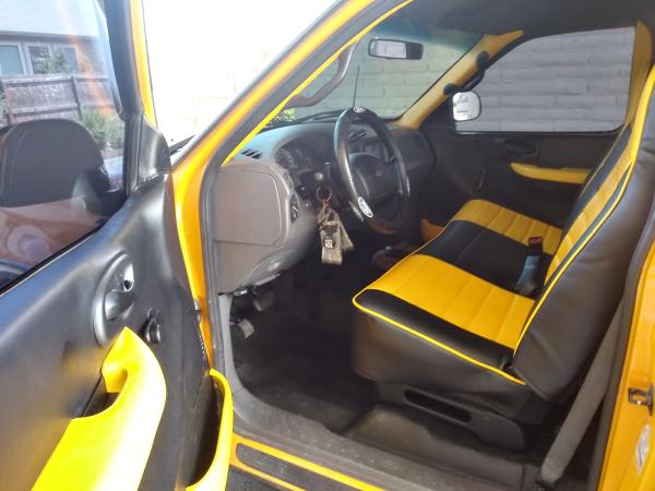 Rauls Auto Trim & Boats Inc