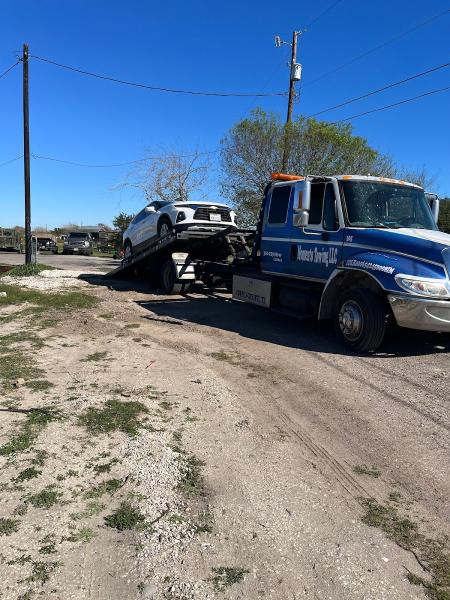 Momento Towing Llc