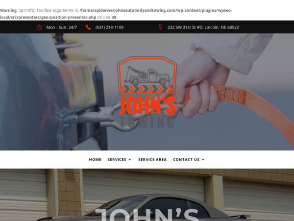 John's Body Shop & Towing